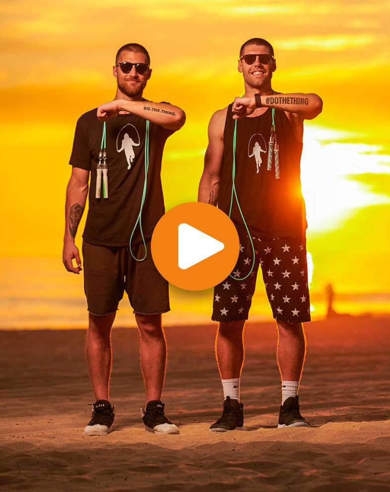 The Jump Rope Dudes holding up their arms